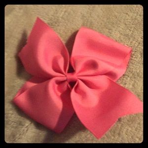 Pink hair tie w/ bow attached